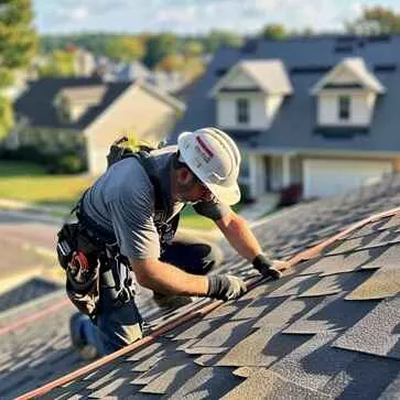 Shingle Masters roofer doing emergency shingle roof repair